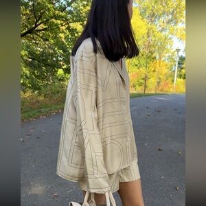 TOTEME Set of long-sleeved shirt and shorts.